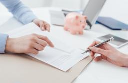 MF interpretuje podatek u źródła, spółki w niepewności